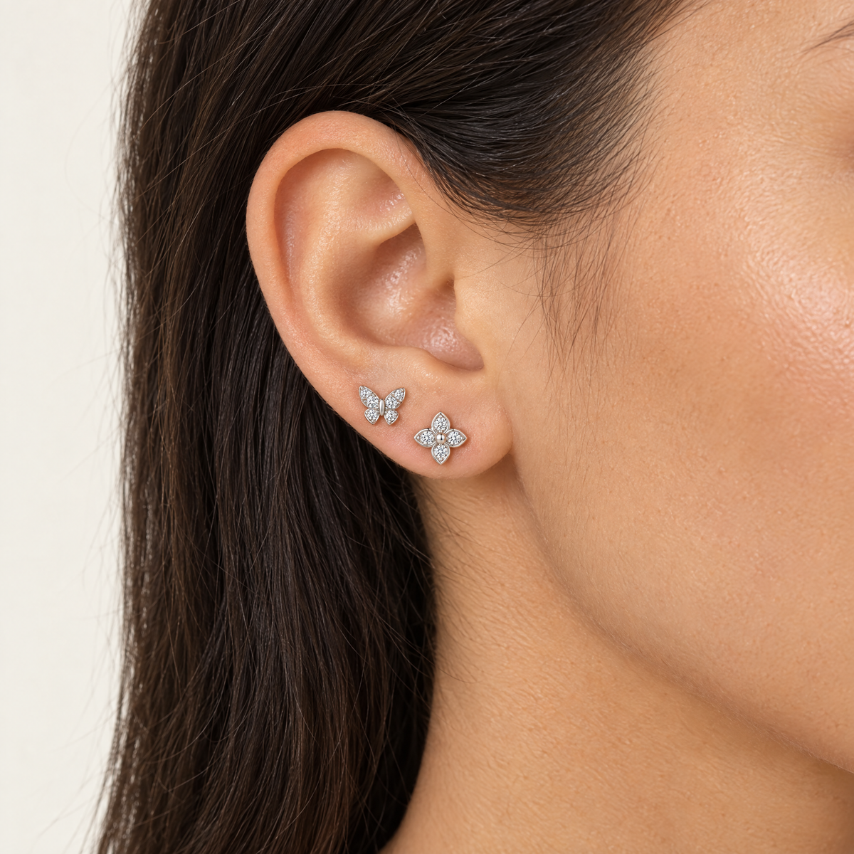 Butterfly and Clover Stud Earrings, worn