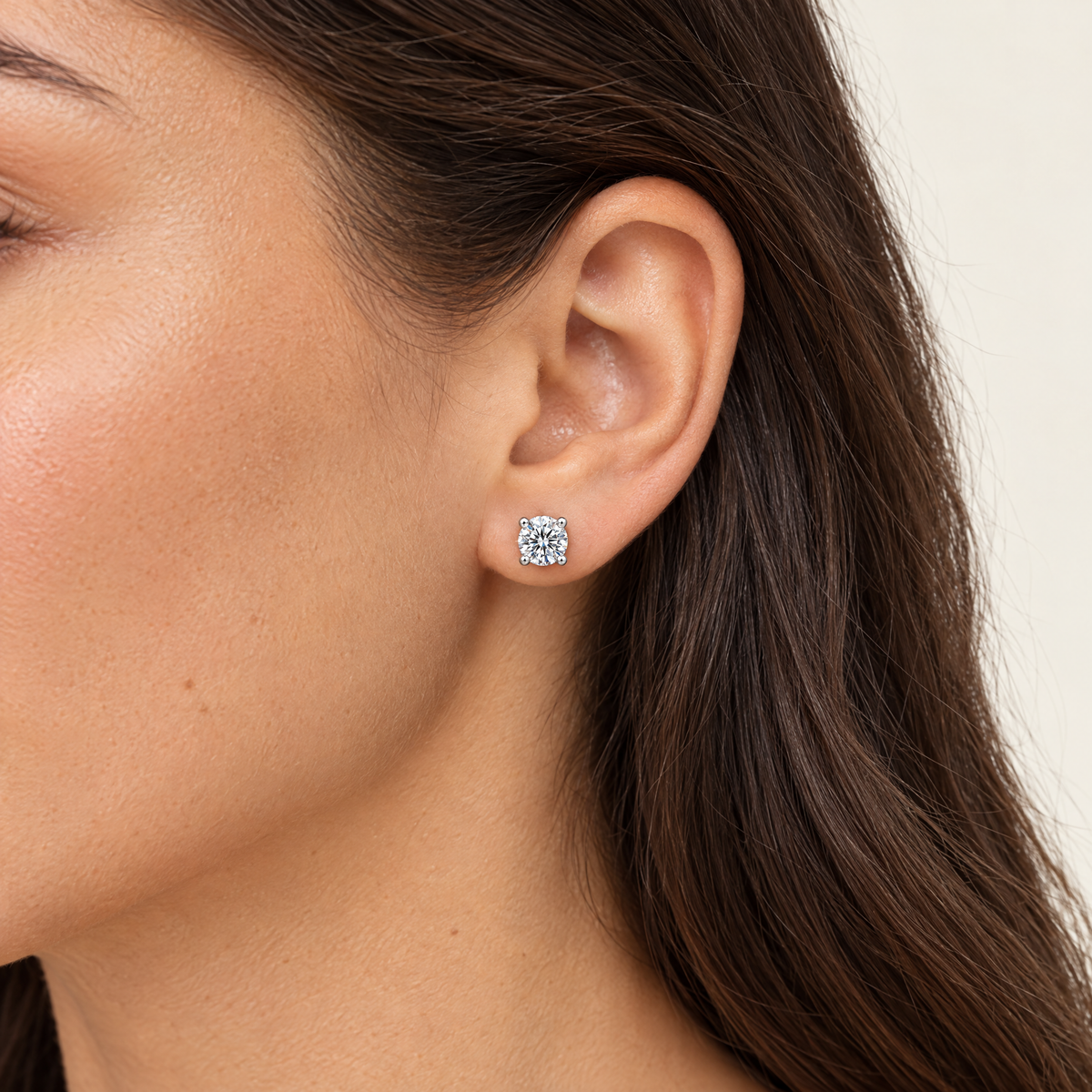 Four-Prong Stud Earring, worn
