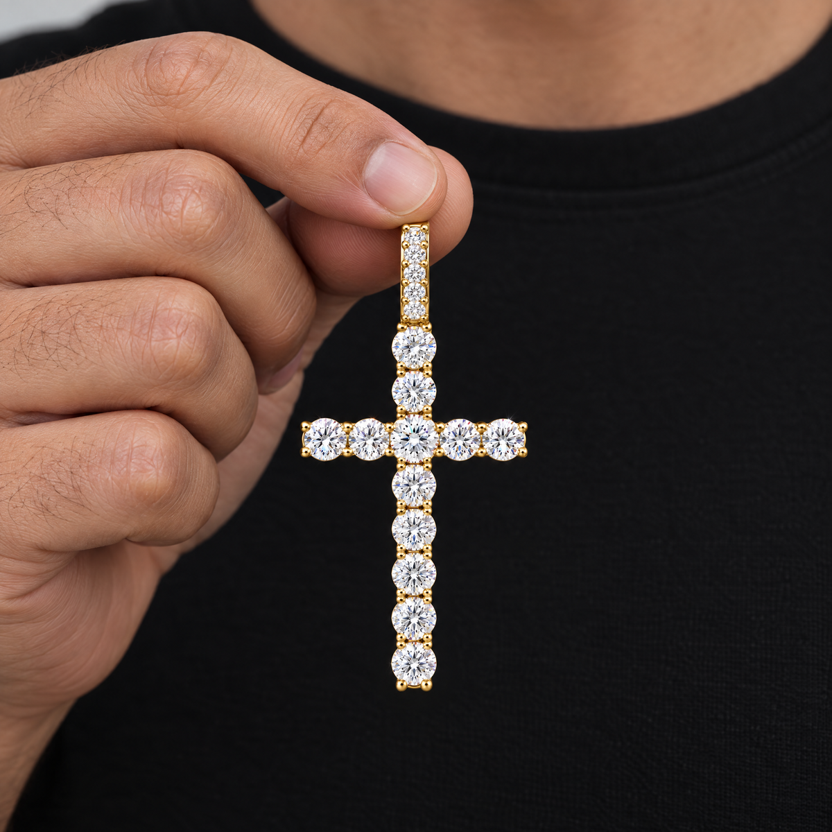 Iced Cross Pendant in 18K gold plating, held in hand