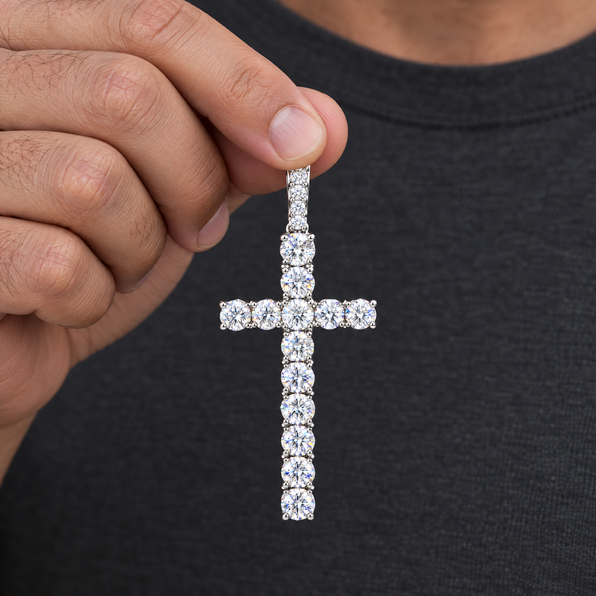 Iced Cross Pendant in sterling silver, held in hand