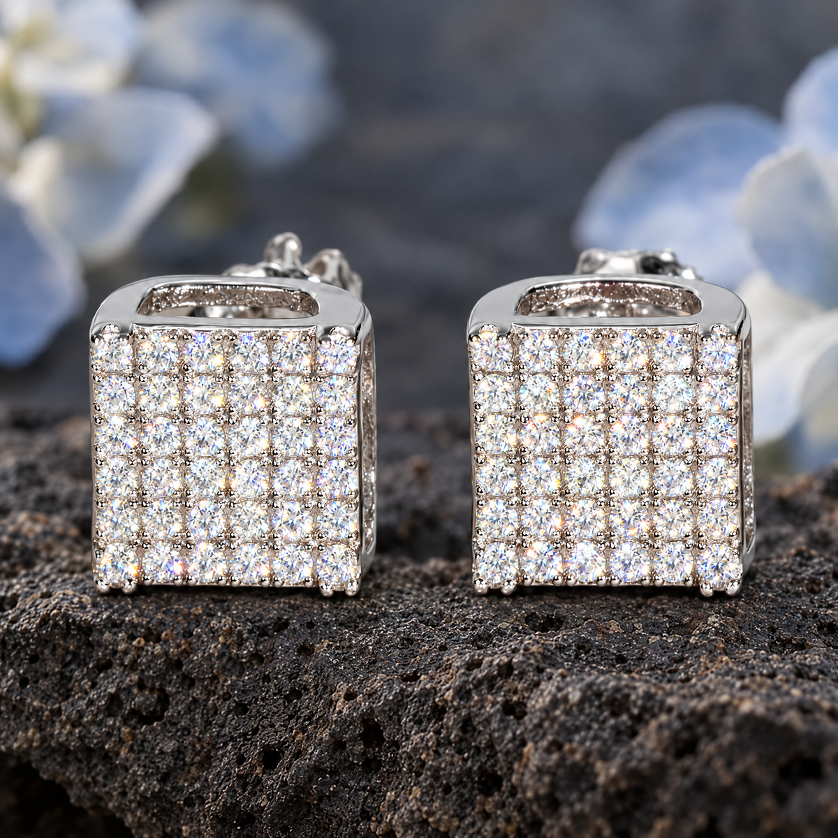 Iced Square Stud Earrings on dark volcanic rock